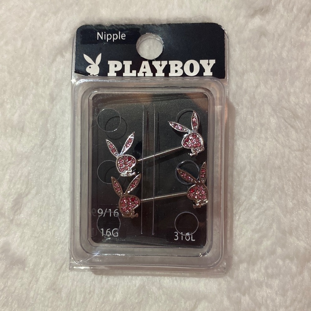 Playboy nipple piercings